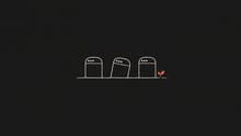 Three app-shaped gravestones with a small orange sprout beside them