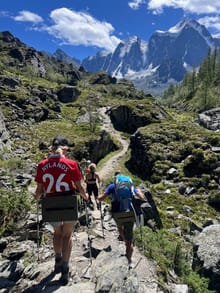 Steven hiking up a rocky trail in the Altai Mountains